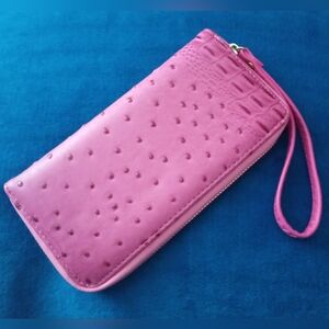 pink embossed wristlet, $13, like new!